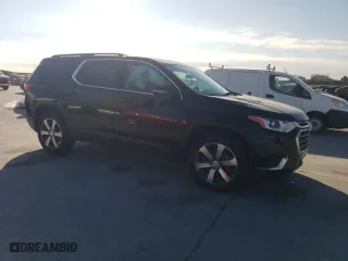 2020 Chevrolet Traverse LT Leather with VIN 1GNERHKW4LJ129571, listed as a Copart auction lot 53031825 with 128,657 mi miles and Salvage Title. Bid and sale history available at carsss.com. Image 4.