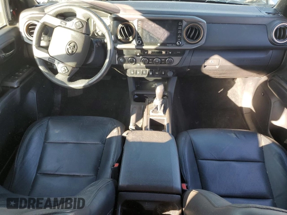 2023 Toyota Tacoma SR with VIN 3TMCZ5AN0PM538974, listed as a Copart auction lot 89165095 with 31,281 mi miles and Salvage title. Bid and sale history available at DreamBid. Image 8.