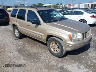 2000 Jeep Grand Cherokee Limited with VIN 1J4G258N4YC283531, listed as a IAAI auction lot 42695142 with 219,794 mi miles and . Bid and sale history available at DreamBid. Image 1.