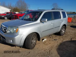 2009 Honda Pilot Touring with VIN 5FNYF48979B008851, listed as a IAAI auction lot 41252736 with 183,292 mi miles and . Bid and sale history available at carsss.com. Image 17.