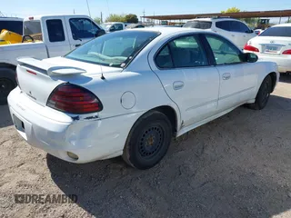 2005 Pontiac Grand Am SE with VIN 1G2NE52E05M215976, listed as a IAAI auction lot 42025657 with 220,418 mi miles. Bid and sale history available at carsss.com. Image 4.
