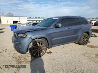 2020 Jeep Grand Cherokee Overland with VIN 1C4RJFCG8LC414033, listed as a Copart auction lot 87403024 with 55,111 mi miles and Salvage Title. Bid and sale history available at carsss.com. Image 1.