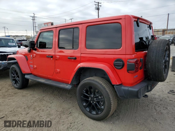 2021 Jeep Wrangler Unlimited Sahara with VIN 1C4JJXP64MW766076, listed as a Copart auction lot 63644955 with 92,421 mi miles and Salvage title. Bid and sale history available at DreamBid. Image 2.