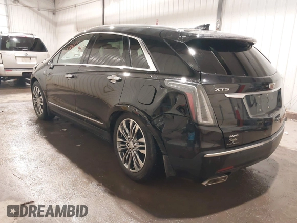 2019 Cadillac XT5 Premium Luxury AWD z VIN 1GYKNFRSXKZ189590, wystawiony jako IAAI lot #41316561 z przebiegiem 98 755 mil mil oraz . Historia ofert i sprzedaży dostępna na DreamBid. Obrazek 3.