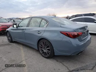 2024 Infiniti Q50 Red Sport 400 with VIN JN1FV7DPXRM660535, listed as a Copart auction lot 82416994 with 2,822 mi miles and Salvage Title. Bid and sale history available at DreamBid. Image 2.
