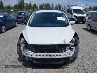 2018 Ford Escape SE z VIN 1FMCU9GD6JUB45046, wystawiony jako IAAI lot #42314262 z przebiegiem 107 962 mil mil oraz . Historia ofert i sprzedaży dostępna na DreamBid. Obrazek 13.