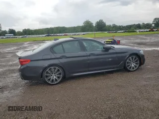 2020 BMW 5 Series M550i xDrive with VIN WBAJS7C06LCD12779, listed as a Copart auction lot 61136215 with 81,286 mi miles and Salvage title. Bid and sale history available at DreamBid. Image 3.
