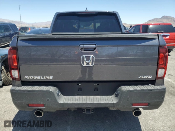 2022 Honda Ridgeline RTL-E with VIN 5FPYK3F73NB039135, listed as a Copart auction lot 60512115 with 27,348 mi miles and Salvage title. Bid and sale history available at DreamBid. Image 6.