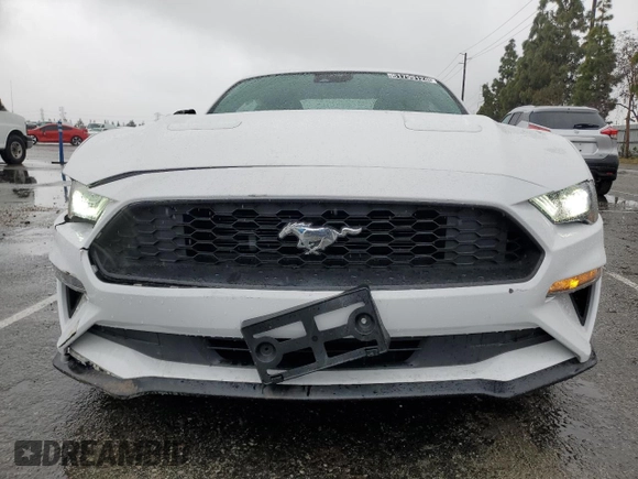 2021 Ford Mustang EcoBoost z VIN 1FA6P8TH5M5126729, wystawiony jako Copart lot #65464594 z przebiegiem 25 590 mil mil oraz Szkoda całkowita • Salvage title. Historia ofert i sprzedaży dostępna na DreamBid. Obrazek 5.