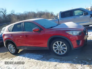 2015 Mazda CX-5 Grand Touring with VIN JM3KE4DY0F0538246, listed as a IAAI auction lot 41629662 with 87,788 mi miles. Bid and sale history available at carsss.com. Image 14.