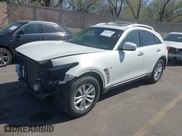 2014 Infiniti QX70 with VIN JN8CS1MW7EM413033, listed as a IAAI auction lot 41993136 with 148,838 mi miles and . Bid and sale history available at DreamBid. Image 19.