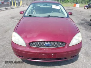 2004 Ford Taurus SES with VIN 1FAFP55S84A141126, listed as a IAAI auction lot 42200307 with 122,195 mi miles and . Bid and sale history available at DreamBid. Image 6.