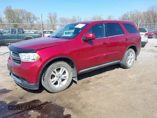 2013 Dodge Durango SXT z VIN 1C4RDJAGXDC674481, wystawiony jako IAAI lot #41994968 z przebiegiem 157 502 mil mil oraz . Historia ofert i sprzedaży dostępna na DreamBid. Obrazek 2.