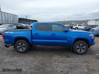 2016 Toyota Tacoma SR with VIN 5TFCZ5AN8GX031900, listed as a IAAI auction lot 41953283 with 166,344 mi miles. Bid and sale history available at carsss.com. Image 14.