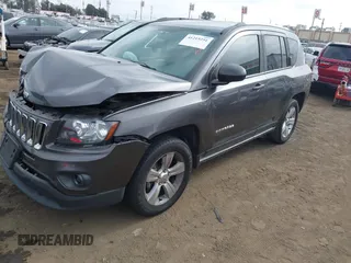 2014 Jeep Compass Sport with VIN 1C4NJCBB4ED789823, listed as a IAAI auction lot 41215251 with 152,709 mi miles. Bid and sale history available at carsss.com. Image 2.