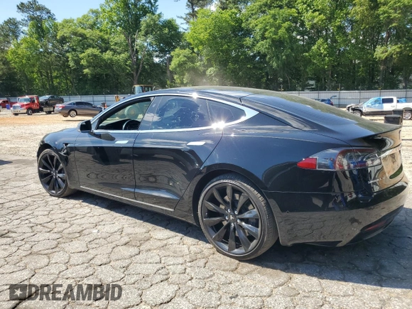 2017 Tesla Model S 100D with VIN 5YJSA1E28HF192397, listed as a Copart auction lot 55455995 with 90,534 mi miles and Salvage title. Bid and sale history available at DreamBid. Image 2.