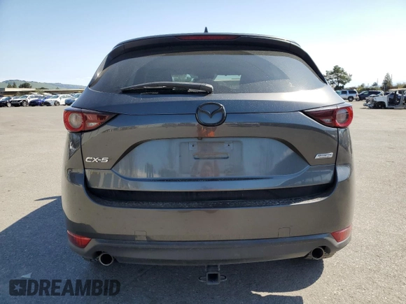2017 Mazda CX-5 Touring with VIN JM3KFACLXH0131443, listed as a Copart auction lot 48524845 with 102,731 mi miles and Salvage Title. Bid and sale history available at carsss.com. Image 6.