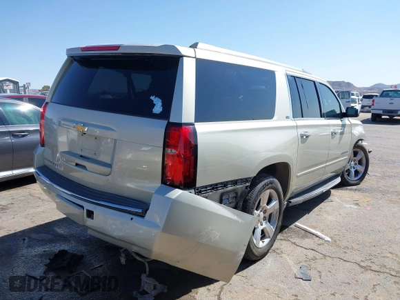 2016 Chevrolet Suburban LTZ with VIN 1GNSKJKC6GR279483, listed as a IAAI auction lot 41973085 with 171,176 mi miles and . Bid and sale history available at DreamBid. Image 4.