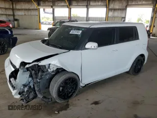 2012 Scion xB with VIN JTLZE4FE2CJ028761, listed as a Copart auction lot 53379165 with 131,758 mi miles and Salvage Title. Bid and sale history available at DreamBid. Image 1.