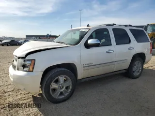2009 Chevrolet Tahoe z VIN 1GNFK13269R244355, wystawiony jako Copart lot #52071944 z przebiegiem 213 697 mil mil oraz Szkoda całkowita • Salvage title. Historia ofert i sprzedaży dostępna na DreamBid. Obrazek 1.