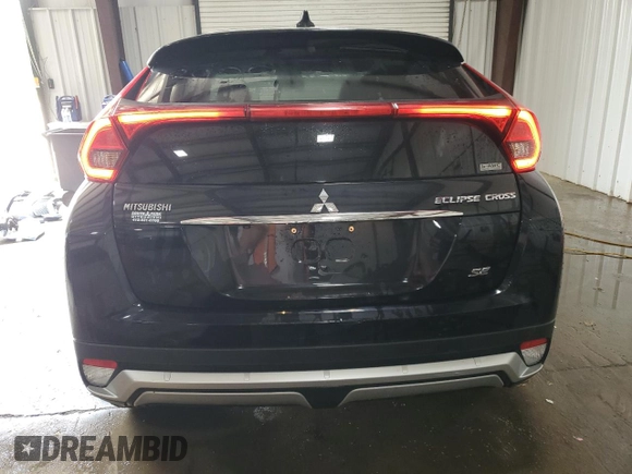 2018 Mitsubishi Eclipse Cross SE with VIN JA4AT5AAXJZ043929, listed as a Copart auction lot 57512045 with 82,296 mi miles and Salvage title. Bid and sale history available at DreamBid. Image 6.