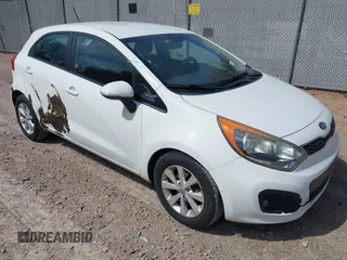 2012 Kia Rio EX with VIN KNADN5A37C6031494, listed as a IAAI auction lot 42052186 with 141,765 mi miles. Bid and sale history available at carsss.com. Image 1.