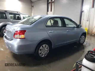2010 Toyota Yaris with VIN JTDBT4K35A4064446, listed as a Copart auction lot 52099855 with 61,934 mi miles and Salvage Title. Bid and sale history available at carsss.com. Image 3.