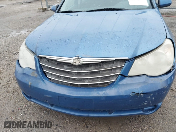 2007 Chrysler Sebring Touring z VIN 1C3LC56K47N533285, wystawiony jako IAAI lot #41869938 z przebiegiem 189 721 mil mil oraz . Historia ofert i sprzedaży dostępna na DreamBid. Obrazek 6.