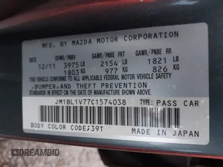 2012 Mazda 3 i Touring with VIN JM1BL1V77C1574038, listed as a IAAI auction lot 41934883 with 172,656 mi miles and . Bid and sale history available at DreamBid. Image 9.