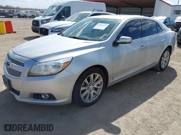 2013 Chevrolet Malibu LTZ with VIN 1G11H5SA3DF192011, listed as a IAAI auction lot 42022440 with 124,603 mi miles and . Bid and sale history available at DreamBid. Image 2.