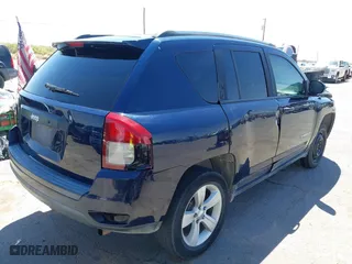 2014 Jeep Compass Sport with VIN 1C4NJCBB2ED737297, listed as a IAAI auction lot 42056598 with 185,155 mi miles. Bid and sale history available at carsss.com. Image 4.