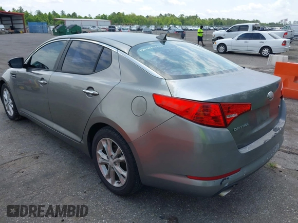 2013 Kia Optima LX with VIN 5XXGM4A77DG161195, listed as a IAAI auction lot 42241468 with 291,814 mi miles and . Bid and sale history available at carsss.com. Image 3.