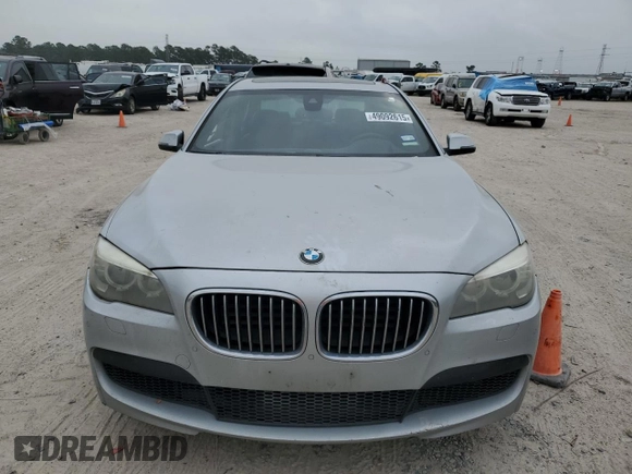 2013 BMW 7 Series 750Li z VIN WBAYE8C56DD133044, wystawiony jako Copart lot #49092615 z przebiegiem 169 699 mil mil oraz Szkoda całkowita • Salvage title. Historia ofert i sprzedaży dostępna na DreamBid. Obrazek 5.
