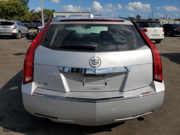2013 Cadillac CTS Wagon Luxury with VIN 1G6DE8E51D0101658, listed as a Copart auction lot 44443065 with 135,727 mi miles and Salvage Title. Bid and sale history available at carsss.com. Image 6.