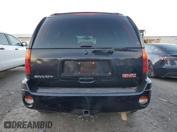 2006 GMC Envoy SLT with VIN 1GKDS13S662220064, listed as a Copart auction lot 84381274 with 237,220 mi miles and Salvage Title. Bid and sale history available at carsss.com. Image 6.