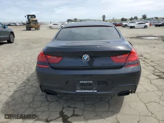 2015 BMW 6 Series 650i with VIN WBA6B2C59FGB99220, listed as a Copart auction lot 50026075 with 100,367 mi miles and Salvage Title. Bid and sale history available at carsss.com. Image 6.
