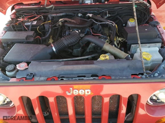 2010 Jeep Wrangler Unlimited Sport with VIN 1J4BA3H10AL171104, listed as a Copart auction lot 53656125 with 192,898 mi miles and Clean Title. Bid and sale history available at carsss.com. Image 12.