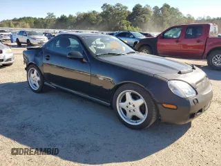 1999 Mercedes-Benz SLK-Class with VIN WDBKK47F4XF129689, listed as a Copart auction lot 75311624 with 54,923 mi miles and Salvage Title. Bid and sale history available at carsss.com. Image 4.