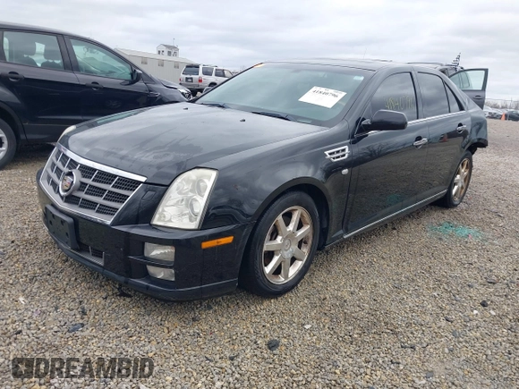 2011 Cadillac STS RWD z VIN 1G6DW6ED8B0159384, wystawiony jako IAAI lot #41840796 z przebiegiem 209 953 mil mil oraz . Historia ofert i sprzedaży dostępna na DreamBid. Obrazek 2.
