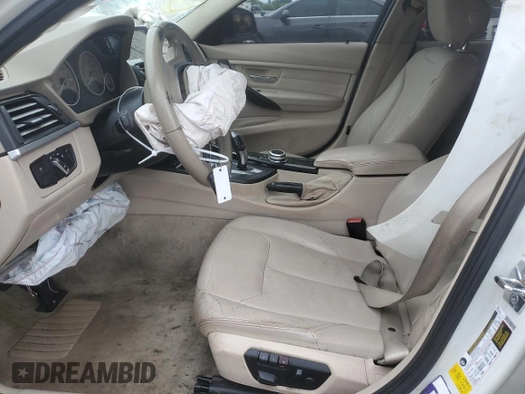 2012 BMW 3 Series 328i with VIN WBA3C1C5XCA696847, listed as a Copart auction lot 53005425 with 143,725 mi miles and Salvage title. Bid and sale history available at DreamBid. Image 7.