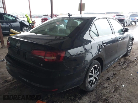 2018 Volkswagen Jetta SE with VIN 3VWDB7AJ3JM214858, listed as a IAAI auction lot 42151137 with 100,346 mi miles and . Bid and sale history available at DreamBid. Image 4.