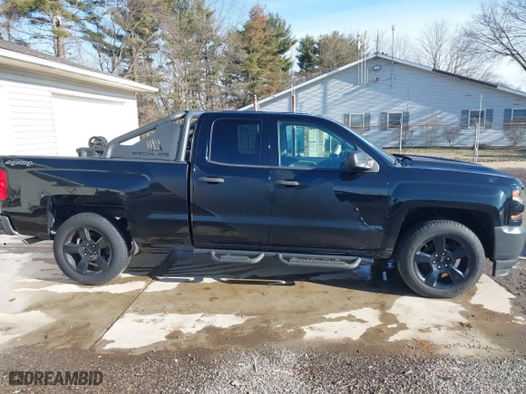 2018 Chevrolet Silverado 1500 Work Truck with VIN 1GCVKNEC1JZ228697, listed as a IAAI auction lot 41666501 with 84,827 mi miles. Bid and sale history available at carsss.com. Image 14.