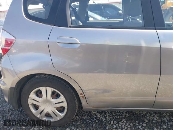 2010 Honda Fit with VIN JHMGE8H20AC010062, listed as a IAAI auction lot 41964011 with 104,651 mi miles. Bid and sale history available at carsss.com. Image 6.