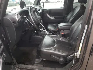 2018 Jeep Wrangler JK Unlimited Sahara with VIN 1C4HJWEG7JL909023, listed as a Copart auction lot 72774404 with 106,801 mi miles and Salvage Title. Bid and sale history available at carsss.com. Image 7.