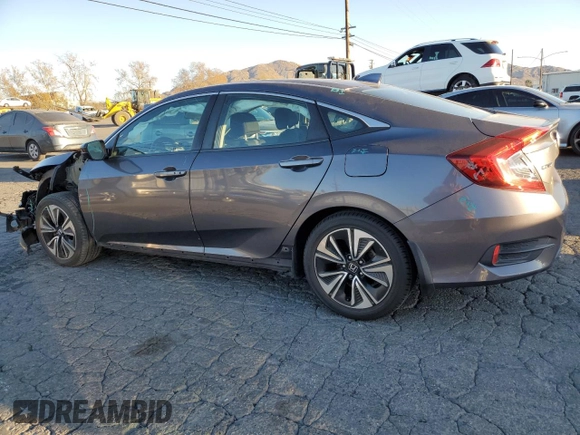 2017 Honda Civic Sedan EX-T with VIN 2HGFC1F49HH652688, listed as a Copart auction lot 87922535 with 108,071 mi miles and Salvage Title. Bid and sale history available at carsss.com. Image 2.