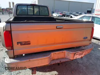 1997 Ford F-350 z VIN 1FTJW35G7VEC80262, wystawiony jako IAAI lot #38286107 z przebiegiem 158 206 mil mil oraz . Historia ofert i sprzedaży dostępna na DreamBid. Obrazek 16.
