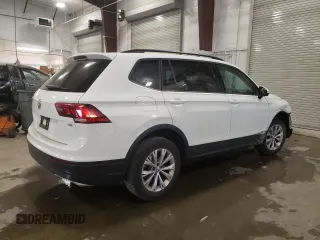 2018 Volkswagen Tiguan S with VIN 3VV1B7AX4JM118670, listed as a Copart auction lot 57055935 with 104,443 mi miles and Salvage title. Bid and sale history available at DreamBid. Image 3.