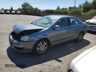2005 Volkswagen Jetta Sedan 2.5L with VIN 3VWSG71K05M625142, listed as a Copart auction lot 71438274 with 186,627 mi miles and Salvage Title. Bid and sale history available at carsss.com. Image 1.