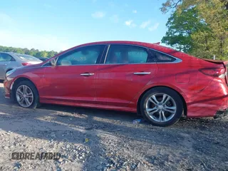 2018 Hyundai Sonata Sport with VIN 5NPE34AF2JH596644, listed as a IAAI auction lot 41986683 with 129,106 mi miles and . Bid and sale history available at carsss.com. Image 14.