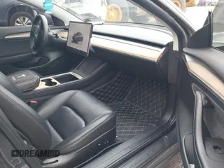 2022 Tesla Model 3 Long Range with VIN 5YJ3E1EB9NF206943, listed as a IAAI auction lot 41911040 with 69,920 mi miles and . Bid and sale history available at DreamBid. Image 5.